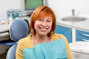 Woman smiling with dental implants